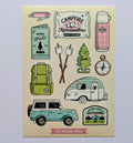 Illustrated camping-themed items on a beige background