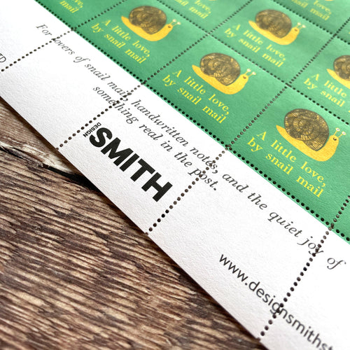 Packaging of Design Smith products on a wooden surface