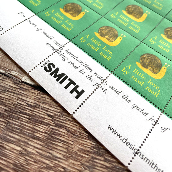 Packaging of Design Smith products on a wooden surface