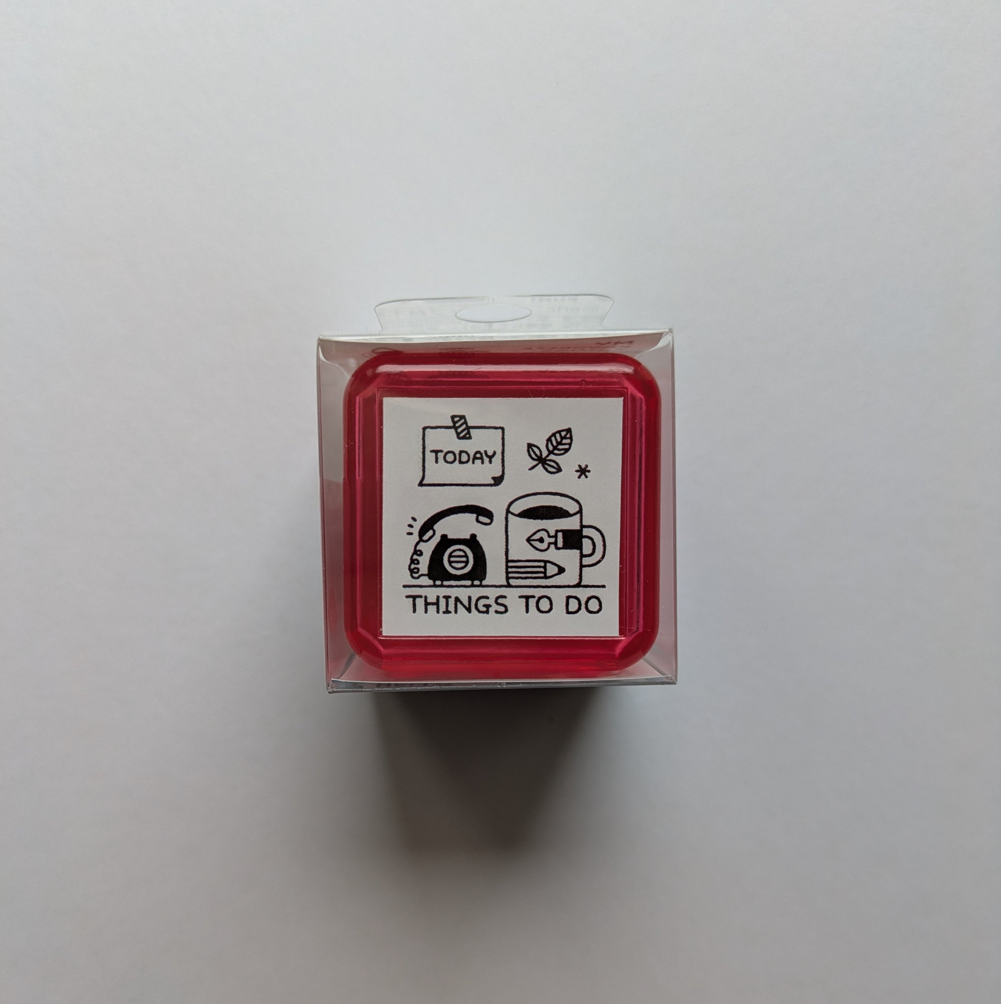 Red Eric Small Things Stamp with words Things to do. 