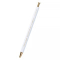 White pen with gold accents on a white background
