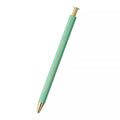 Mint green pen with gold accents on a white background