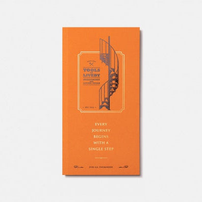 An orange book or booklet titled 'Tools to Liveby' with a dark illustration of a spiral staircase and white text, centered on a light gray background.
