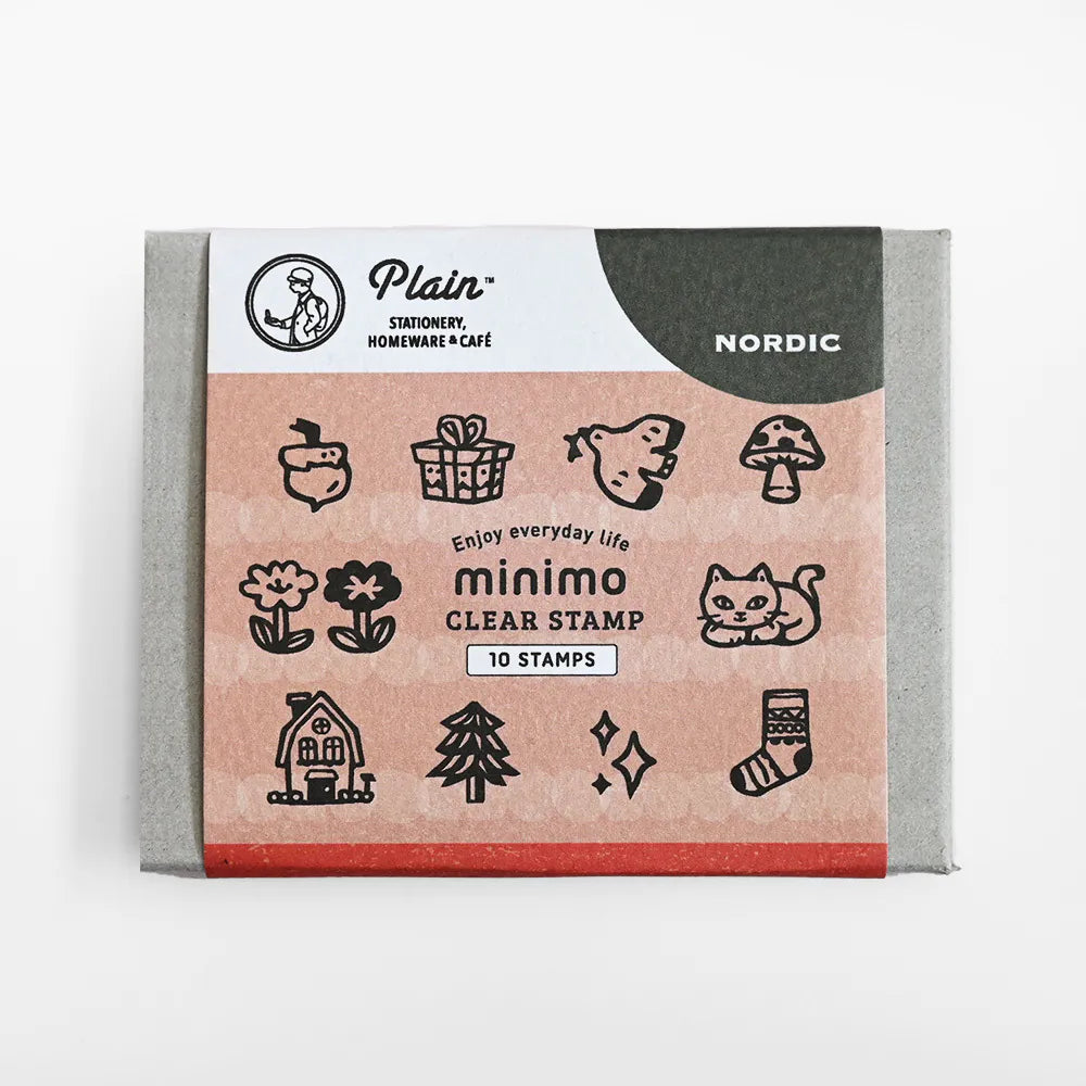 Packaged clear stamp set from Plain Stationery, Homemade & Cafe, featuring 10 black line-art stamps on a pinkish card with a gray backing, labeled 'minimo CLEAR STAMP' and 'NORDIC'.