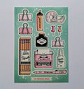 Sticker sheet with stationery items on a light blue background