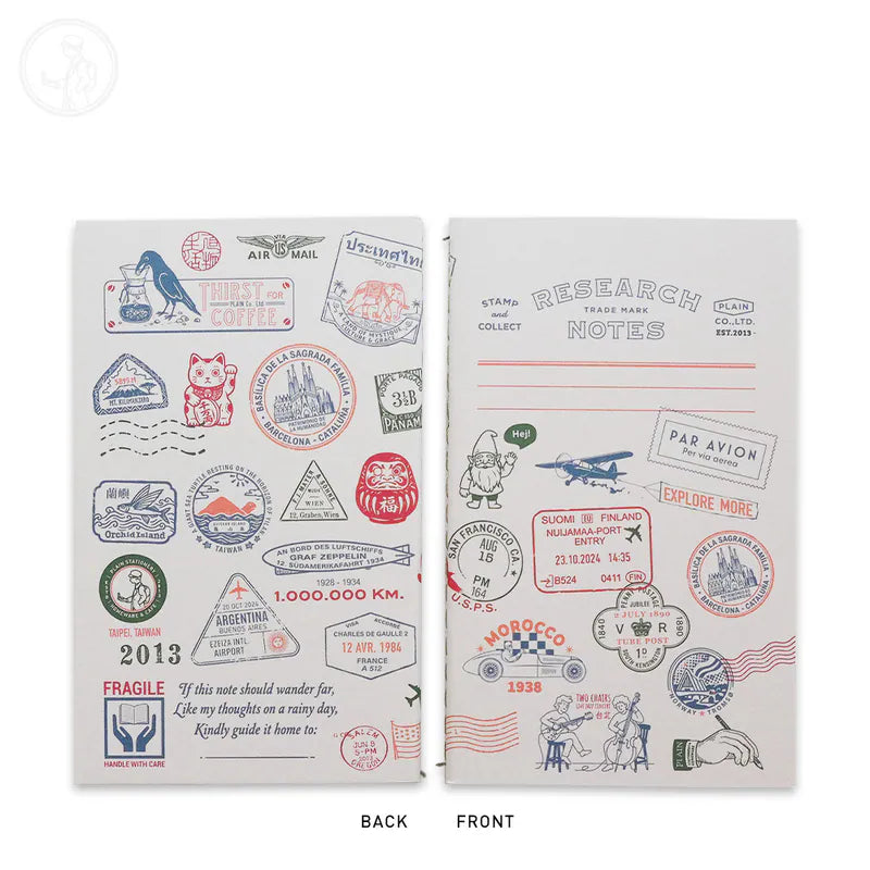 A notebook showing both front and back covers decorated with colorful travel stamps, postmarks, and illustrated stamps in red, blue, and black ink on a white background.