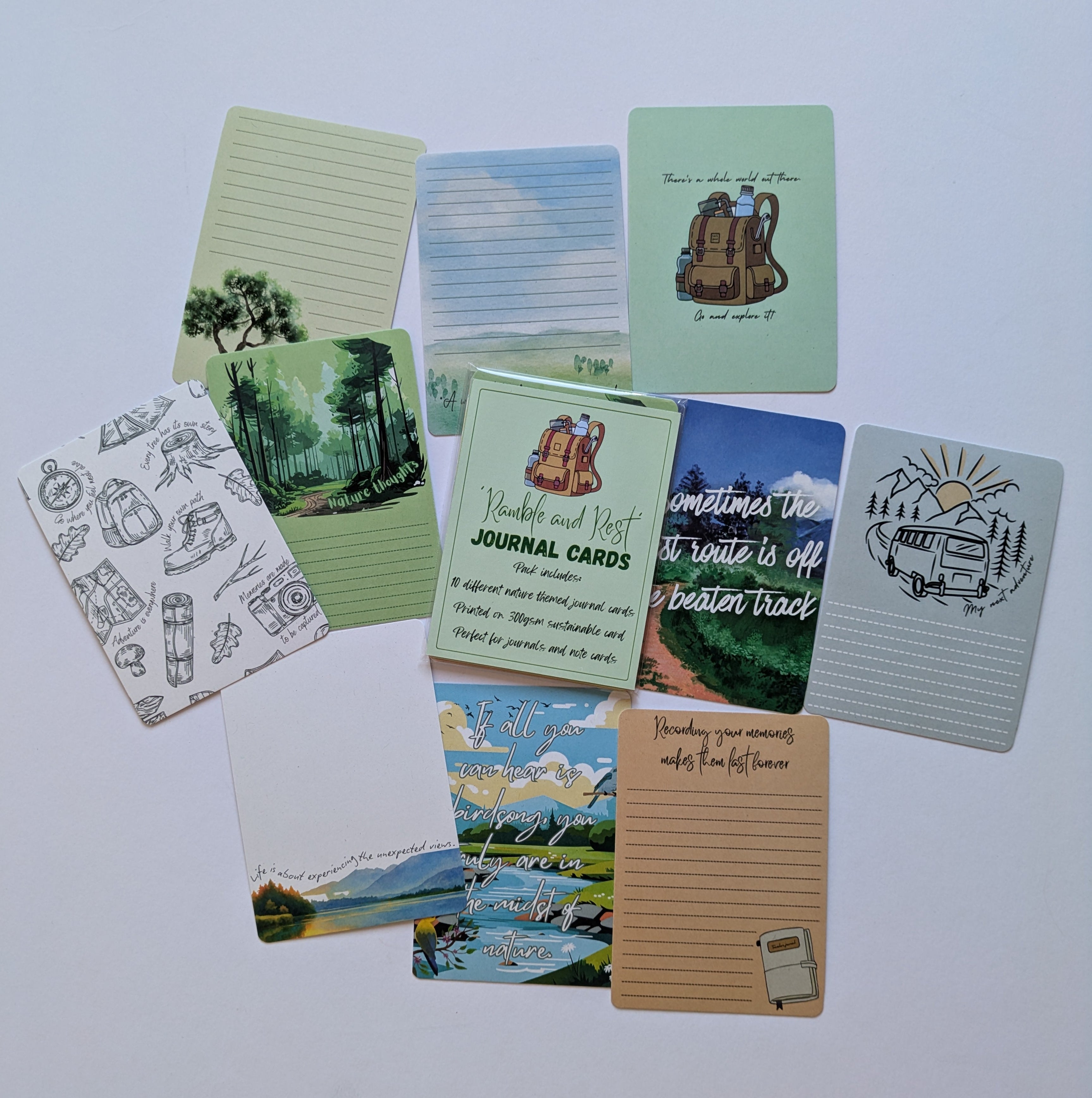 Collection of illustrated journal cards on a white background