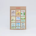 Collection of Madrid-themed stamps on a brown cardboard backing with 'Madrid' text.