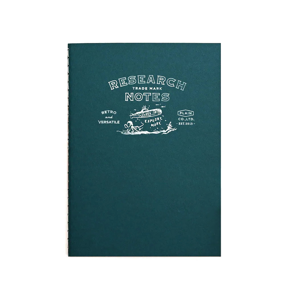 A dark teal blue-green hardcover notebook with white printed text reading 'RESEARCH NOTES' and a small ship illustration on the front cover, shown against a plain white background.
